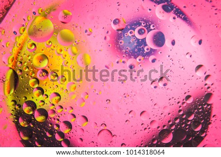 Abstract space background. Water drops of different colours
