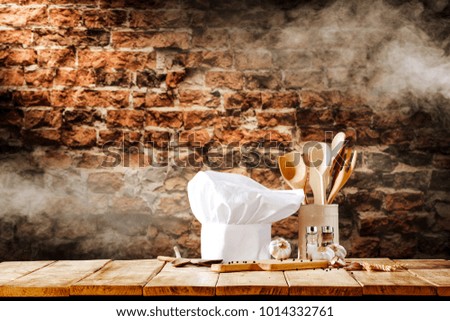 Desk of free space and wall background with smoke. 
