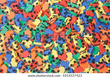 Texture of many colorful small cars, children's toys.
