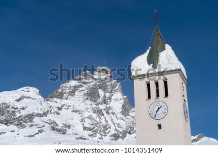Breuil-Cervinia, Aosta Valley, Italy. Bell tower with Mount Cervino in background