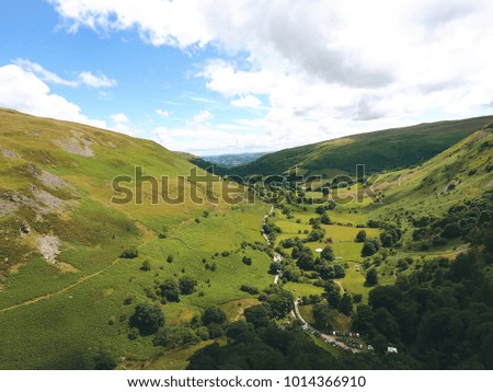 Green valley hills birds eye view - Scenic green landscape aerial photo - Green hiking trails