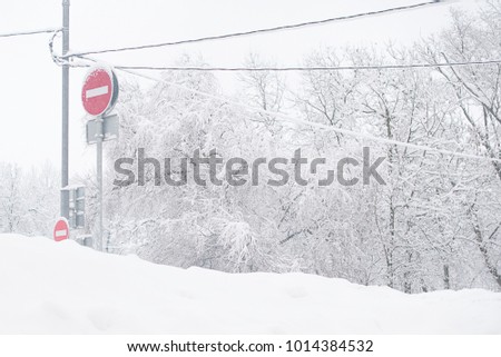 traffic sign in winter snowy day