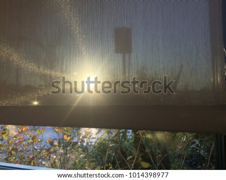 Sunrise/ Sunset coming through the shades