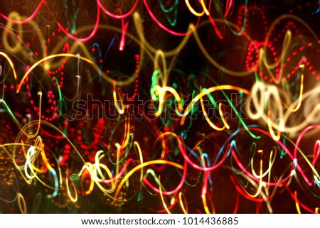 Colorful bright lights neon blured abstract shiny awesome background out of focus