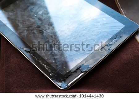 Tablet computer with broken glass screen