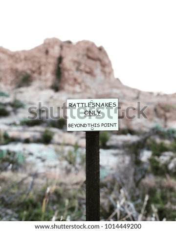 Rattle snakes beyond this point sign