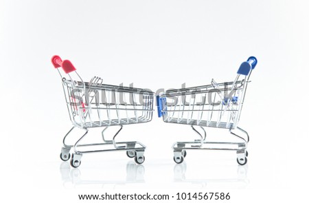 Pair of mini shopping card blue and red empty isolated on white background with copy space