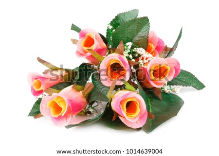 Colorful fabric roses isolated on white background.