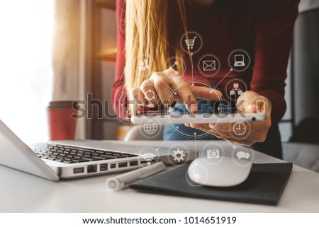 close up of hand using tablet ,laptop, and holding smartphone online banking payment communication network,internet wireless application development sync app,virtual graphic  icon diagram 
