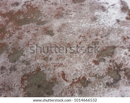 Greyish white snow on floor with colored background, A photo for texture and background abstract