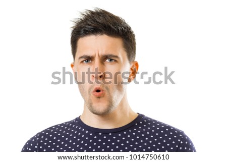 Young stylish handsome black hair guy with amazed face expression on white