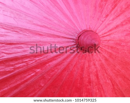 Top view of red paper umbrellas in Asia as background