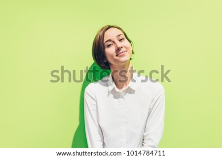 Smiling young lady (green background)
