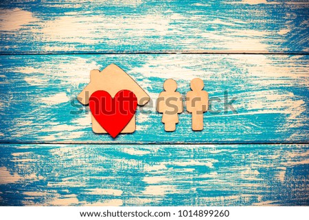 Symbol of home and family on a blue background 