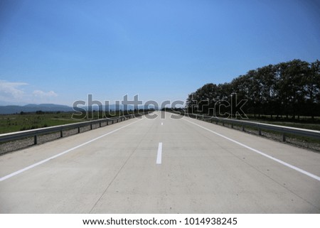highway under the blue sky