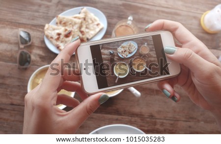 Food photo of indian food on wooden table for social networks