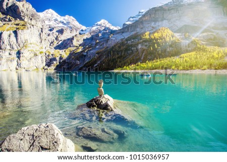 Amazing tourquise Oeschinnensee with  Swiss Alps, Kandersteg, Berner Oberland, Switzerland. Royalty-Free Stock Photo #1015036957