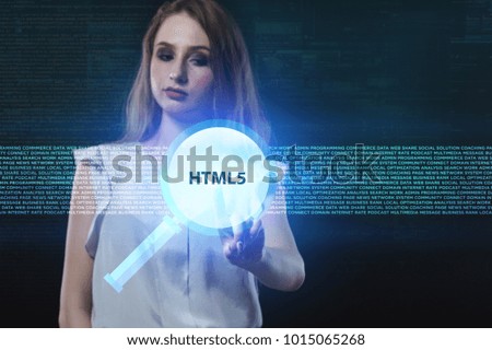 The concept of business, technology, the Internet and the network. A young entrepreneur working on a virtual screen of the future and sees the inscription: HTML5