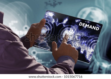 Business, Technology, Internet and network concept. Young businessman working on a virtual screen of the future and sees the inscription: Demand