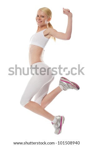 Happy teenager jumping with excitement isolated over white background