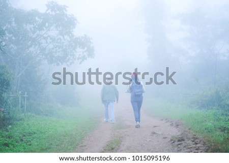foggy pic of the photographer or tourists in the mist , winter