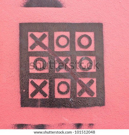 Tic Tac Toe on pink wall
