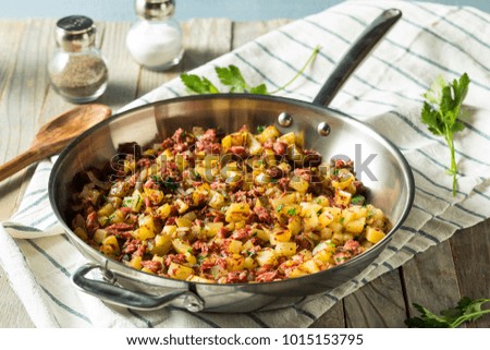 Savory Homemade Corned Beef Hash in a Pan Royalty-Free Stock Photo #1015153795