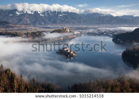 aerial view over lake Bled on a foggy morning from Ojstrica viewpoint, Slovenia, Europe - travel background