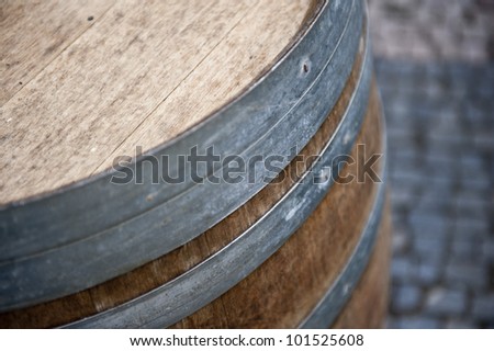 A closeup picture of a wooden barrel for a keg of beer.