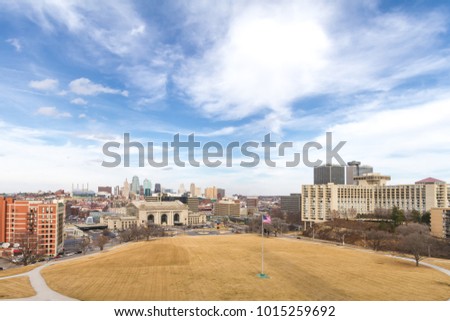 Wide angle view of Kansas City, Missouri during the daytime with all trademarks removed.