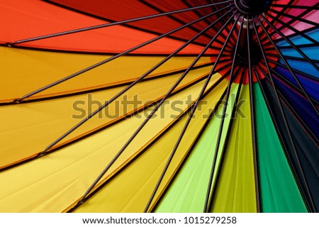 Coloured umbrella as background.