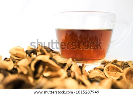 Hot tea of sacha inchi and Sacha Inchi seed on white background