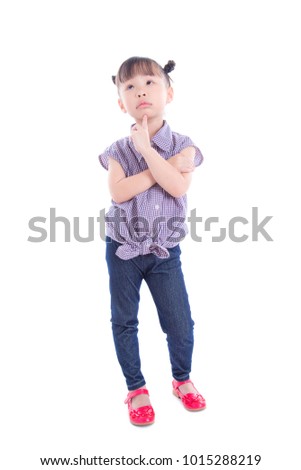 Full length of a Little asian girl thinking while standing over white background