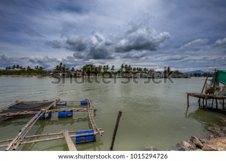 Floating cage Aquaculture farm of Fish in reservoir Thailand ,economic fish industry concept.