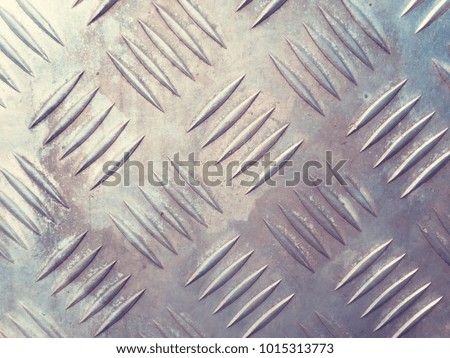 Strip line on the silver stainless plate background.