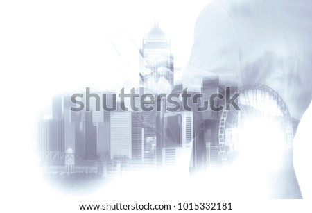 Double exposure of businessman and Hong Kong city view in blue color