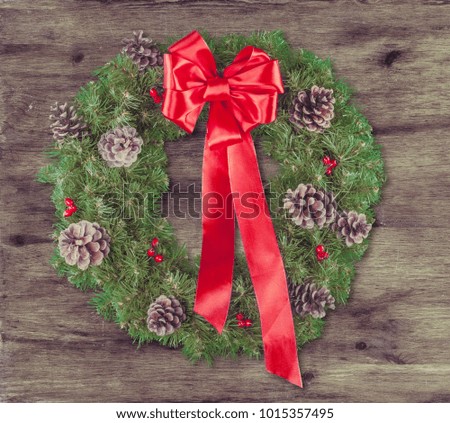 Christmas wreath on wood desk