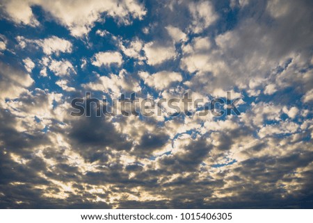 vintage tone image of blue sky and white cloud on day time for background usage.(horizontal).