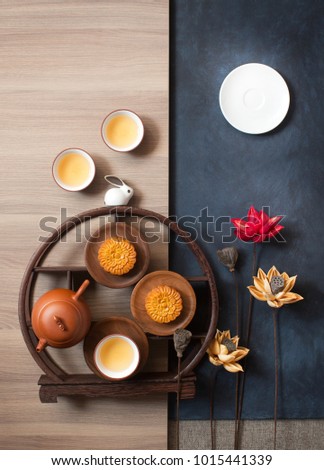 Flay lay mid-autumn festival food and drink still life. Royalty-Free Stock Photo #1015441339