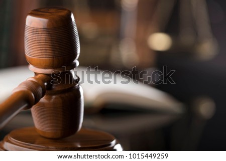 Law concept. Judge's gavel in courtroom library.