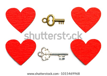 Old key with a heart  isolated on white background.