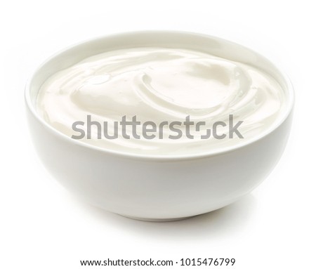 bowl of sour cream yogurt isolated on white background Royalty-Free Stock Photo #1015476799