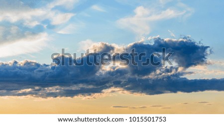 panorama background. rays of the sun make their way through clouds. sunset and sunrise
