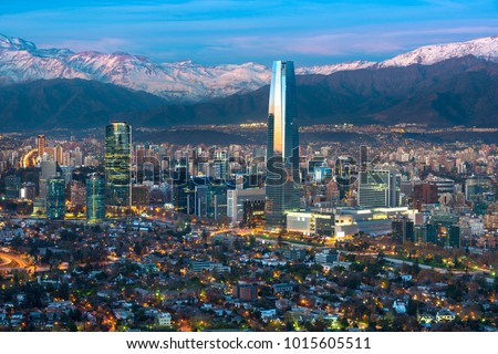 Panoramic view of Providencia and Las Condes districts with Costanera Center skyscraper, Titanium Tower and Los Andes Mountain Range, Santiago de Chile Royalty-Free Stock Photo #1015605511