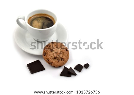 Chocolate cookie with coffee stock images. Cup of coffee on a white background. White cup of coffee with snack. Cup of coffee with cookie. Espresso with sweetness
