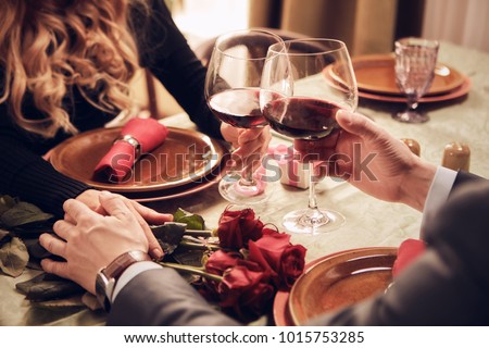 Romantic date. A couple in a restaurant. Royalty-Free Stock Photo #1015753285