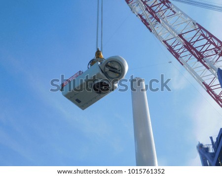          
Wind turbines erection at sea
 Royalty-Free Stock Photo #1015761352