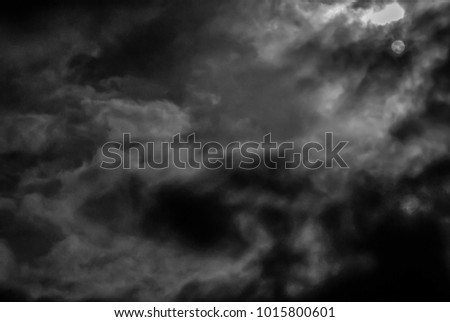moon hidden behind the clouds