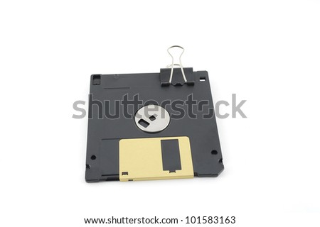Floppy disc for computer and clip over white