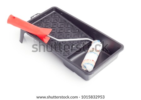 paint roll brush in plastic tray